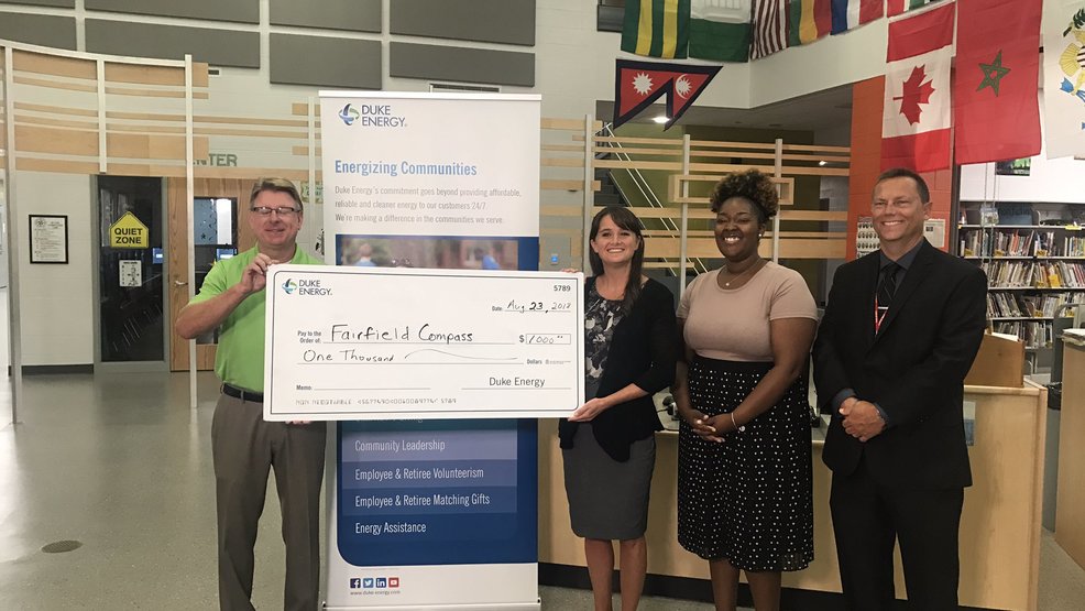 Duke Energy presents check to SOTW Compass Elementary WKRC